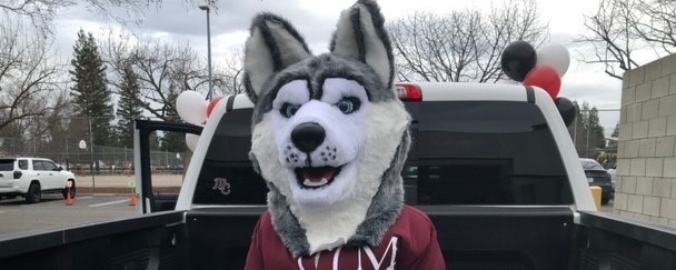 mascot in truck 